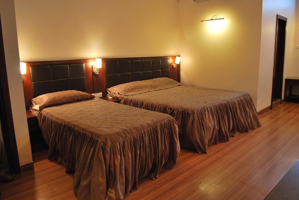 Hotel Millennium Guwahati Rom bilde